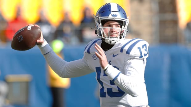 Nov 19, 2022; Pittsburgh, Pennsylvania, USA; Duke Blue Devils quarterback Riley Leonard (13) passes against the Pittsburgh Panthers during the first quarter at Acrisure Stadium.